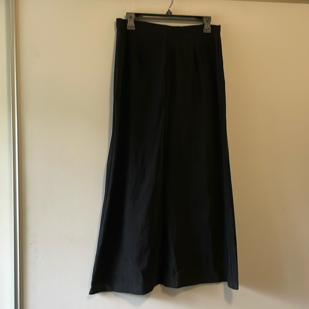 Women’s long black suede A-line skirt.